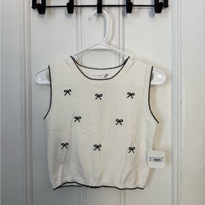 Altar'd State Cream Sleeveless Top with Black Bow Accents